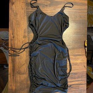 VNTG Boutique dress with cut out sides. Size Large